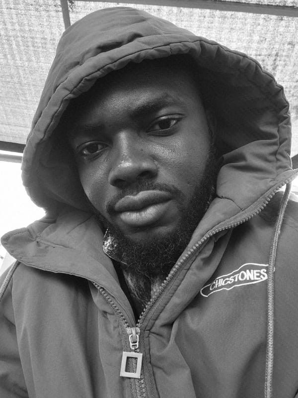 Man photographed with cat at Nigerian gas station
