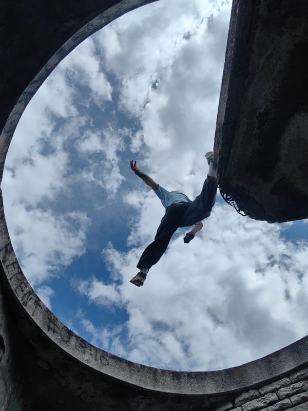 Person captured in dynamic pose from concrete structure in Varna
