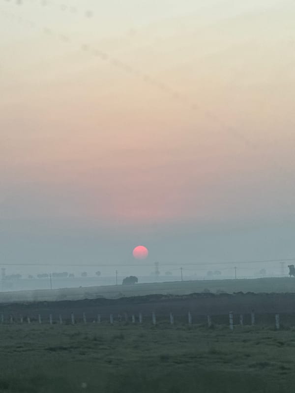 Red sun observed through hazy conditions in rural Mexico