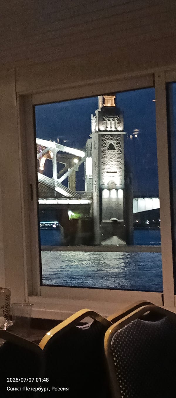 Saint Petersburg bridge tower lit up at night