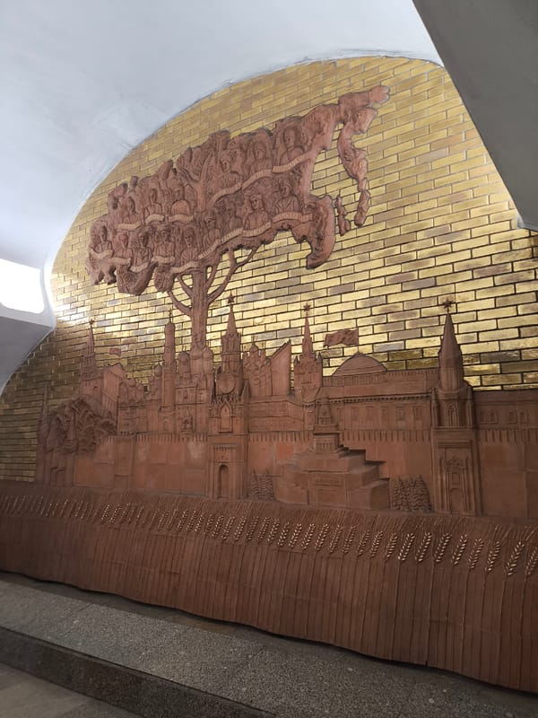 Witnesses document ornate Moscow Arbatskaya metro station architecture, reliefs