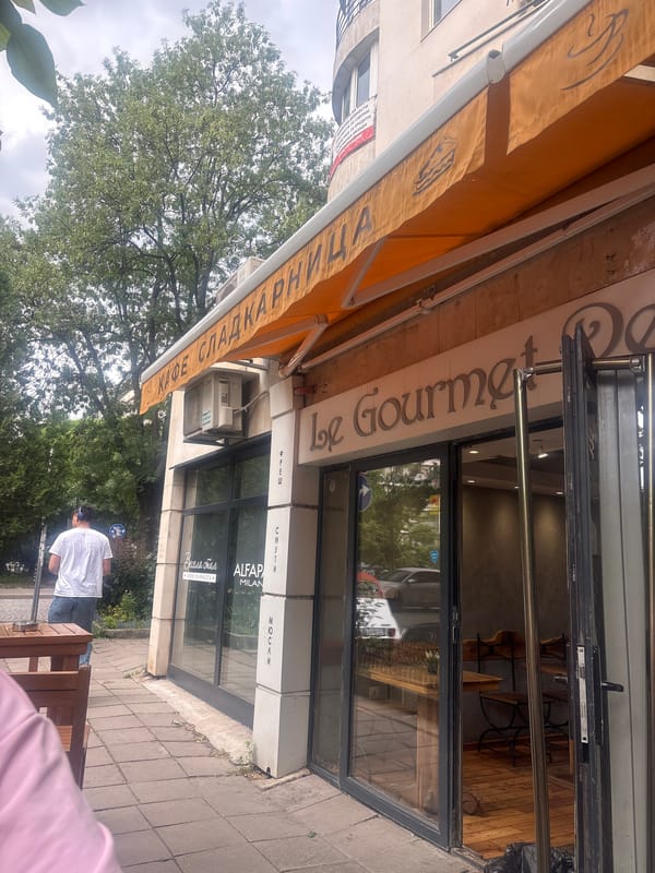 Morning street scene documented at Sofia café and intersection