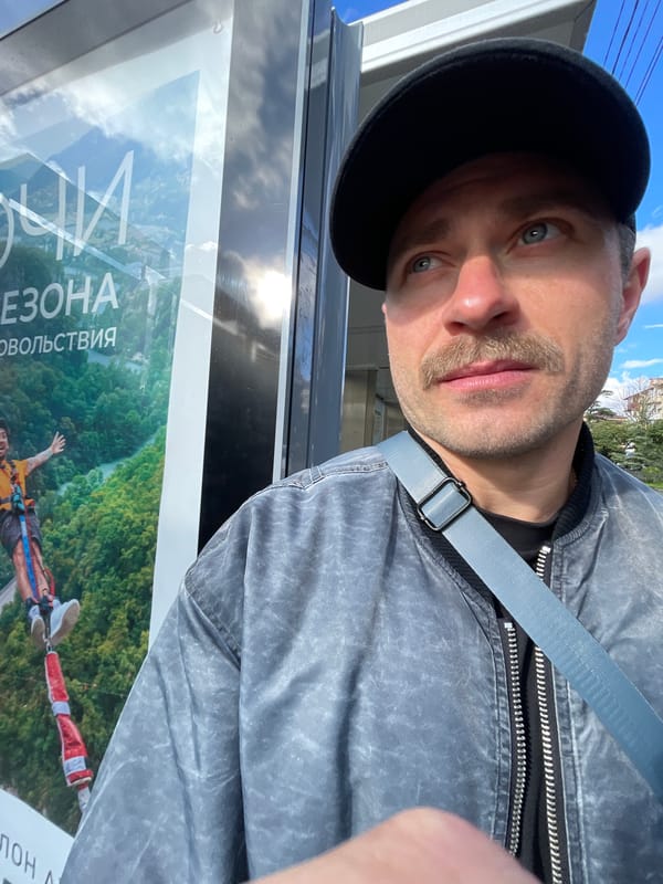 Tourist documents rainy day sightseeing in Sochi, Russia