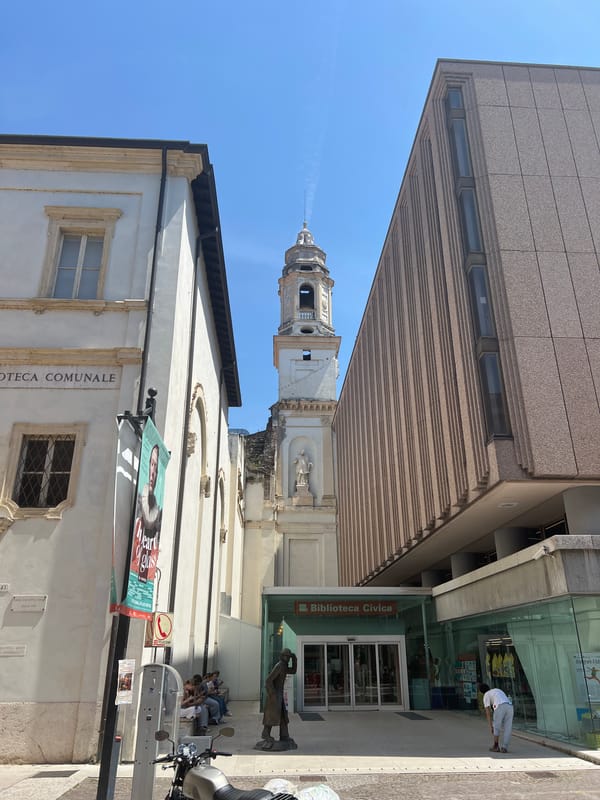 Morning in Verona: towers, streets, and riverside views