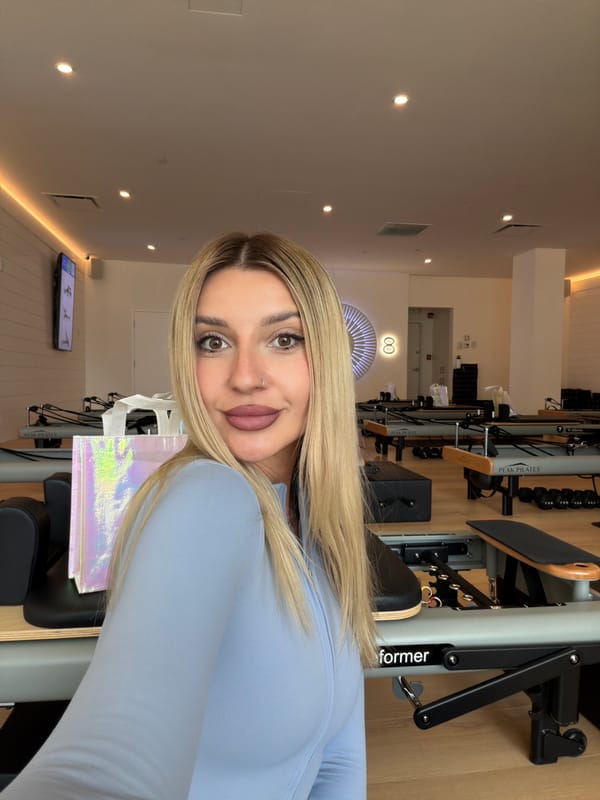 Inside a Calgary Pilates studio, reformers lined up and ready