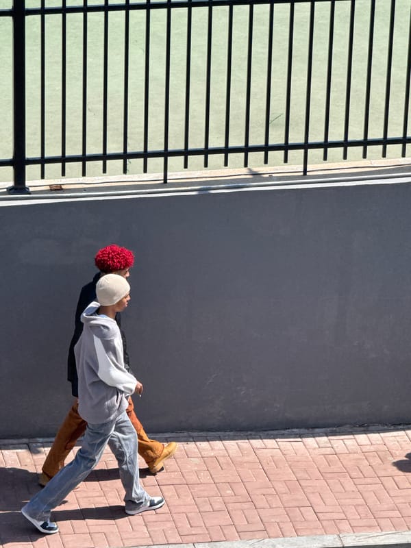 Groups lie on pavement near scooters in Zhongtun, China