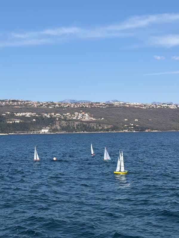 Recreational pier activities and model boat racing in Opatija