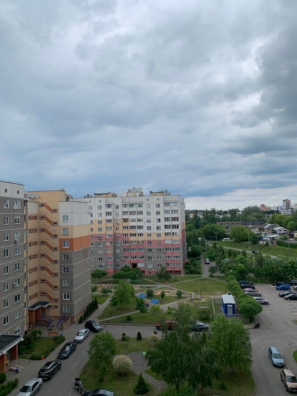 Daily life documented in Hrodna residential complex under cloudy skies