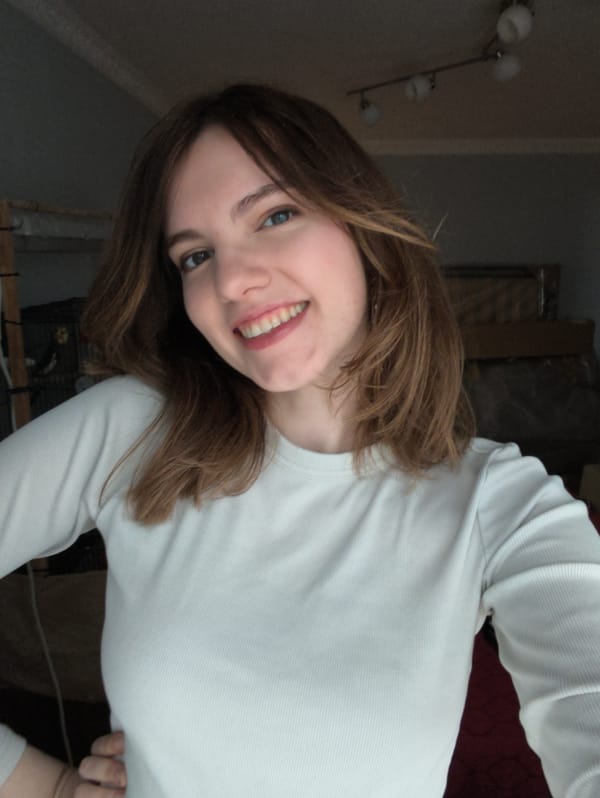 Portrait of smiling woman photographed at unknown location