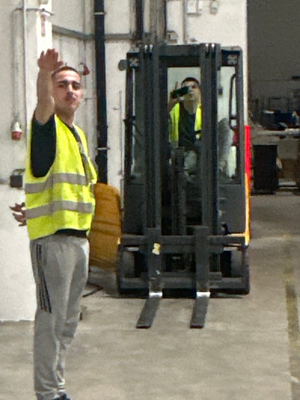 Late-night warehouse hangout in Schweitenkirchen, safety vests and all