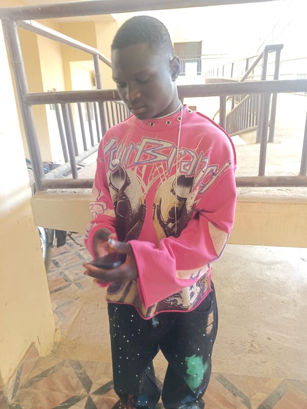 Students take exam in Akwanga classroom