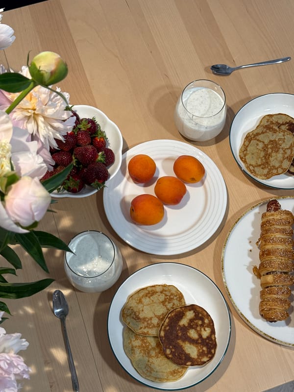 Styled home breakfast with peonies and fresh fruit, Izhevsk