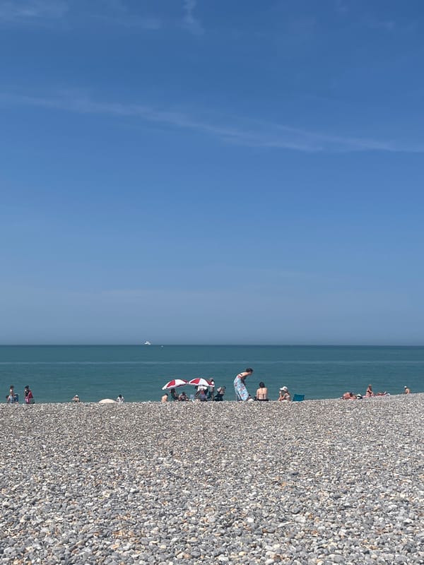 Busy summer afternoon on Dieppe's pebble beach