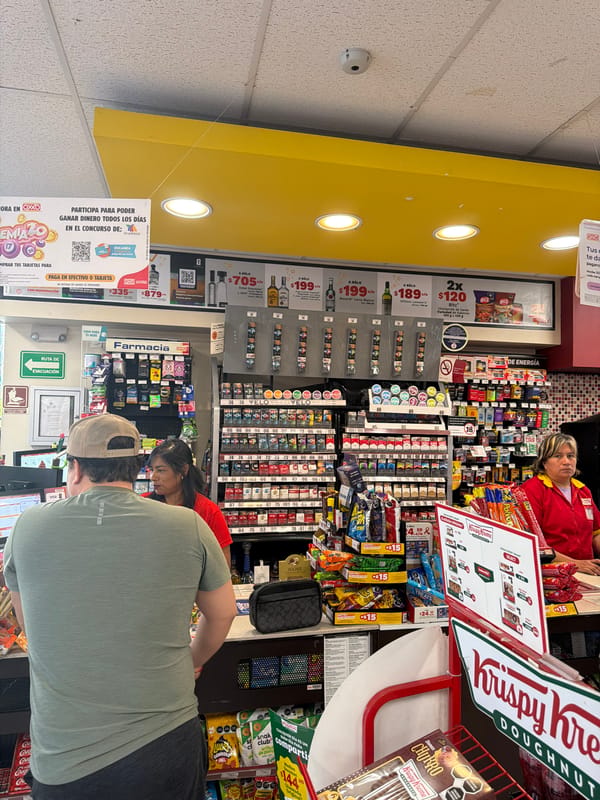 Customer makes purchase at OXXO store in Cholula
