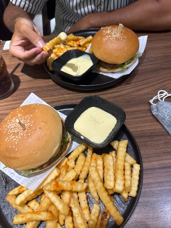 Diners share casual meal at decorated restaurant in Đà Nẵng