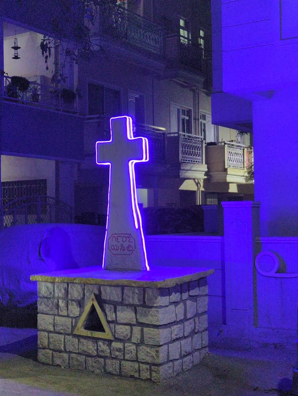 Illuminated roadside shrine observed in Bengaluru evening