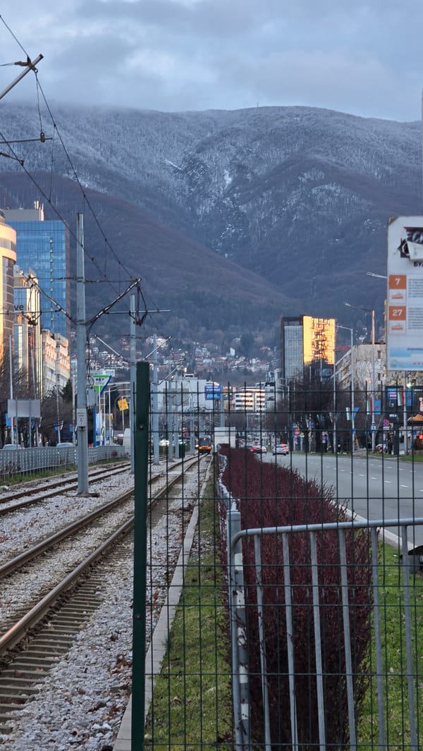 Railway tracks and resting traveler documented in Sofia