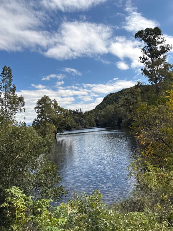 Motorcycle rider captures scenic lake views in Argentine village