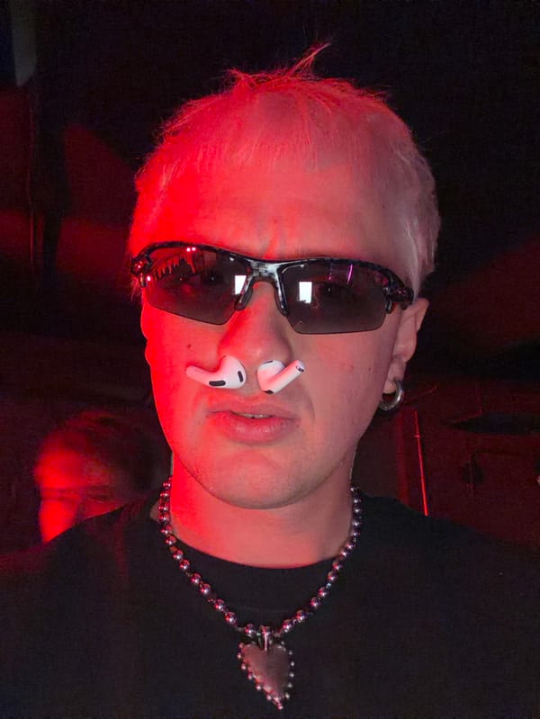 Moscow DJ Event Features Red-Lit Venue, Dancing Crowds