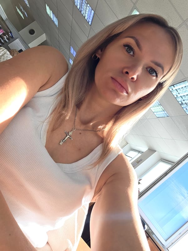 Indoor selfie and a quiet rural road in Chaikovsky, Russia