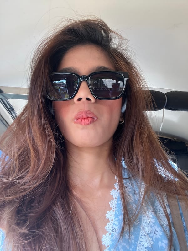 Woman takes selfies during tuk-tuk ride in Panabo City