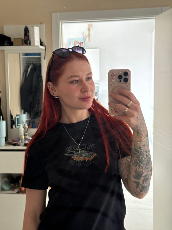 Woman takes selfies, pets cat in Rostov-on-Don apartment