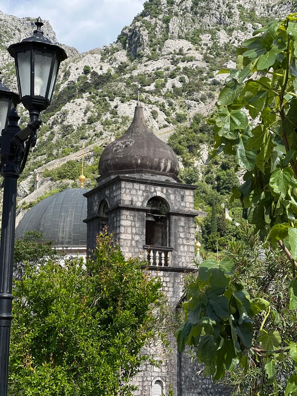 Casual tourist moments captured in historic Kotor, Montenegro