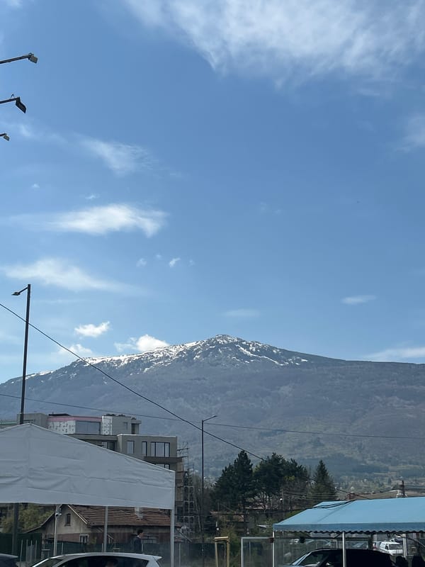 Mountain view captured from urban Sofia under cloudy skies