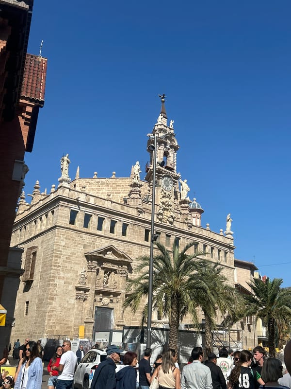 Morning architectural documentation in Valencia captures historic church, residential building