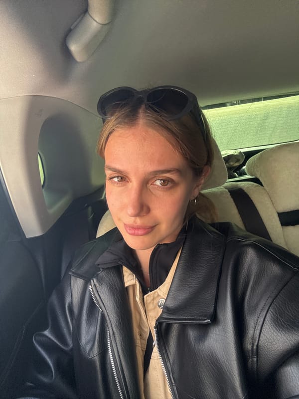 Woman photographed in car interior in Yekaterinburg