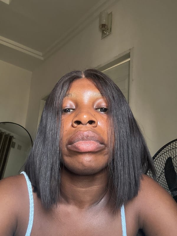Woman takes selfies indoors in Abuja