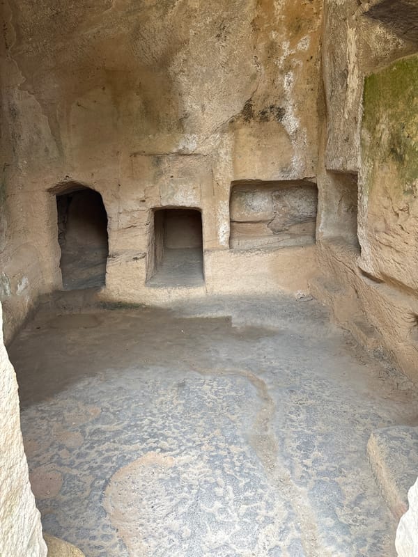 Visitor explores ancient tombs and coastal landscapes in Paphos