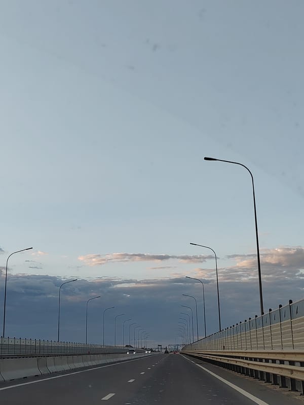 Twilight drive over a Brest highway overpass