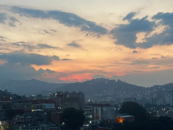 Dusk skyline captured over Caracas mountain cityscape