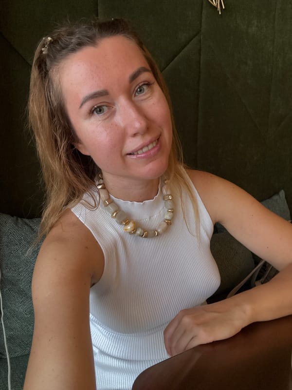 Woman documents sunny urban walk and cafe meal