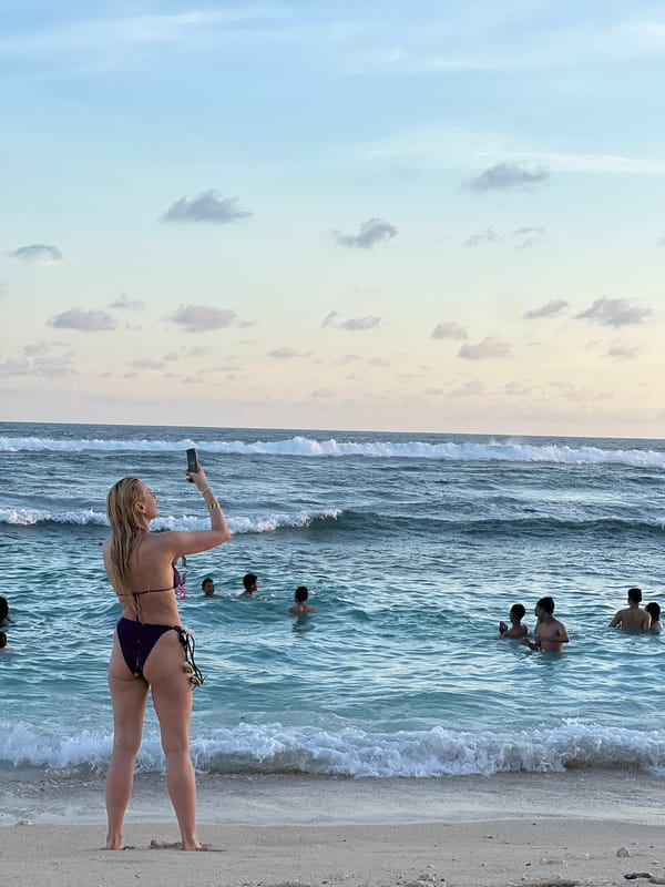 Typical Beach Day Unfolds Across South Kuta Bali Coastline