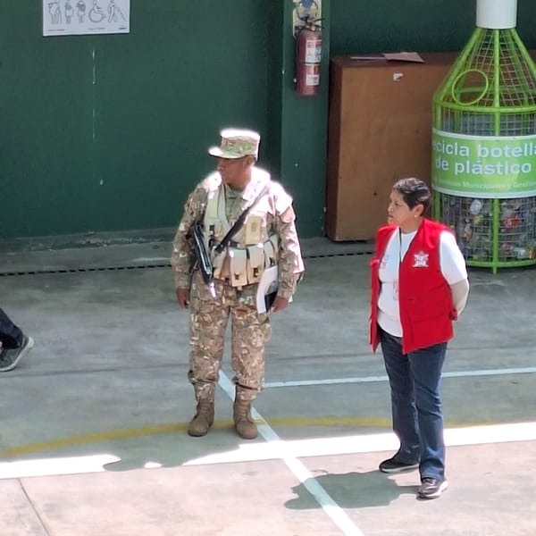 Armed soldiers secure voting station in Mariano Melgar, Peru