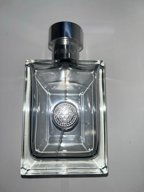 Perfume bottle collection documented in early morning Laval session