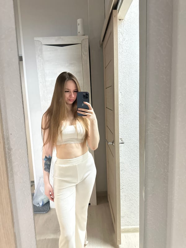 Woman Takes Multiple Mirror Selfies Across Indoor Locations