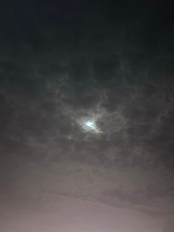 Bright celestial object pierces heavy clouds over Kotel, Bulgaria