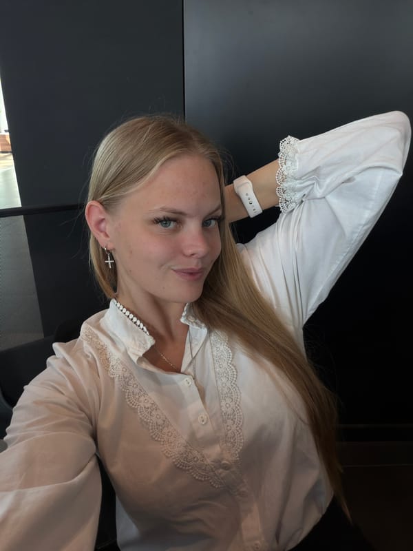 Quick selfie session in an Izhevsk restroom, white lace blouse
