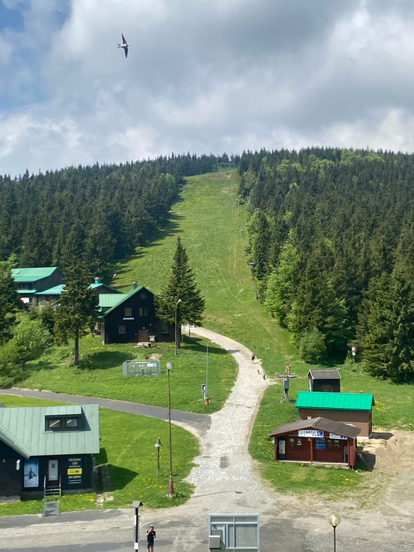 Athletic group gathers near Czech hydroelectric facility in mountains