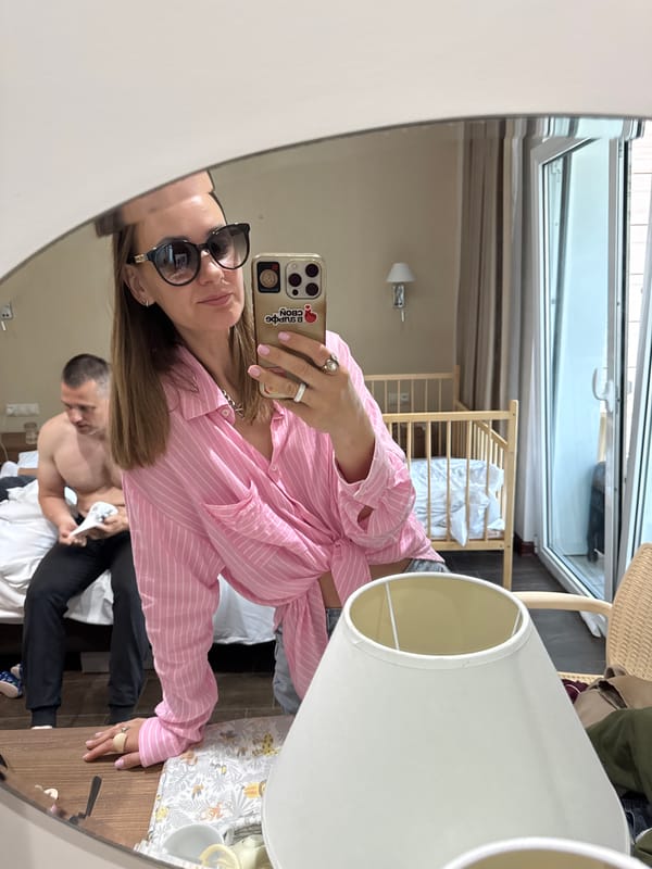 Woman takes mirror selfies in Gagra hotel room