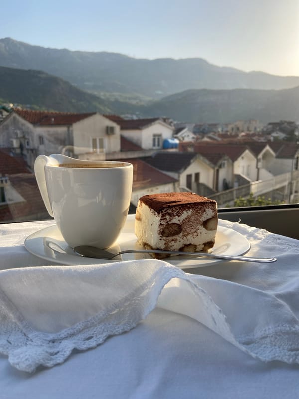 Morning terrace scene captured from elevated view in Budva