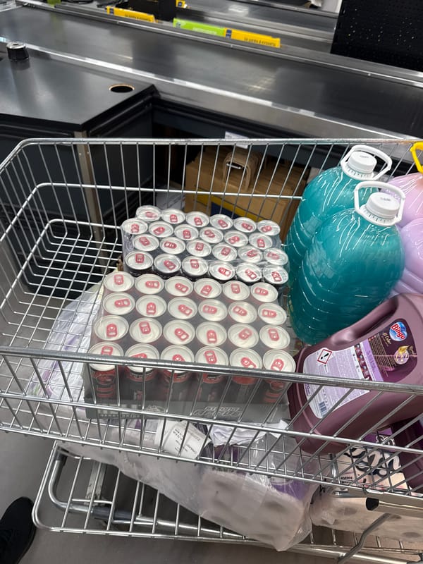 Shopper purchases turquoise bottles in Stara Zagora store