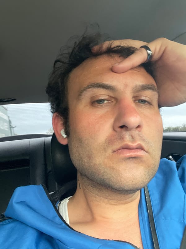 Man photographed with hand on forehead in Mountnorris