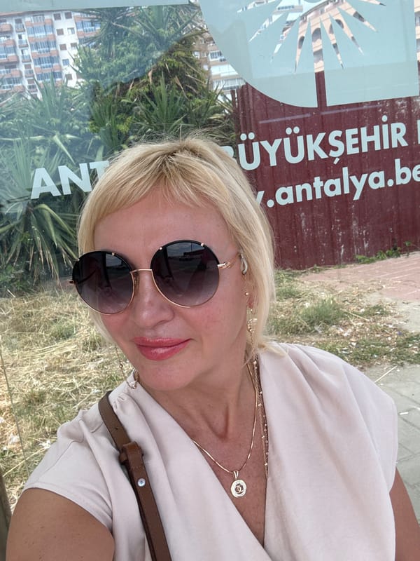 Women photographed at seaside bus stop in Antalya