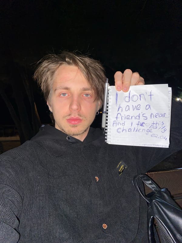 Man documents personal feelings in notebook near Montenegro beach