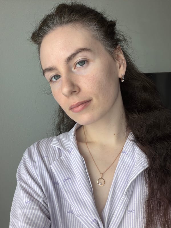 Woman takes multiple selfies in Yanino-1, Russia
