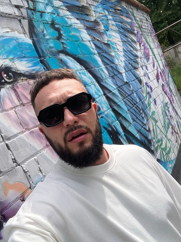 Selfies at a graffiti wall, with a cafe stop in Chaikovsky